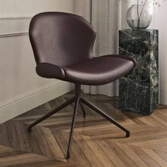 Superior Cattelan Italia Rachel turn chair with smooth deep brown leather-like upholstery and a four-spoke swivel base