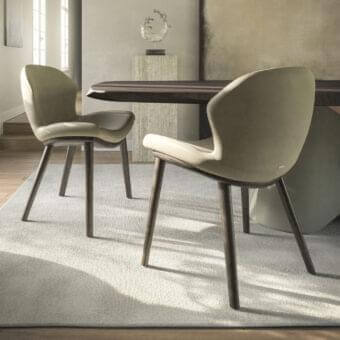 Distinctive Cattelan Italia Rachel chair with light beige shell and seat, built with a smooth dark brown precious wood base