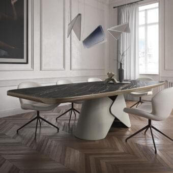 Distinguished Cattelan Italia Scott Keramik table with dark marble-effect ceramic and light brushed edges built upon a cream curved metal pedestal base