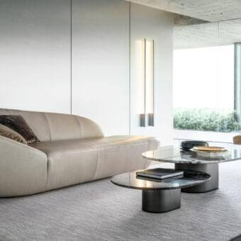 Sophisticated 4 Mariani Moore relax lounge chair with textured brown textile upholstery and satin-finish metal tripod base