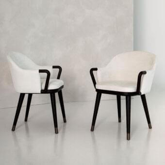 Elegant Rugiano Camilla armchair with white textile upholstery and stained wengè wood base crafted with a rounded backrest