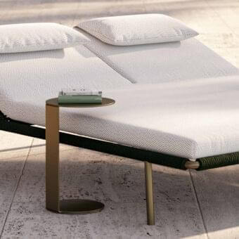 Superior Rugiano Paride side table in bronze metal brings Italian elegance with a sleek cylindrical form and round top