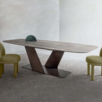 Exceptional Rugiano Wally table crafted in Italy with varnished bronze base and decorated painted wood top exhibiting a striated grain pattern