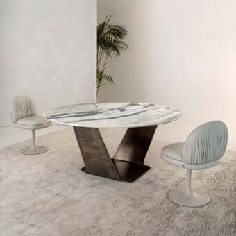Elegant Rugiano Wally table with grey and white marble-like top and varnished bronze, sculpturesque metal base crafted in Italy