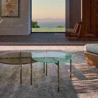 Distinctive Rugiano Apollo coffee table with round bronze fused glass and refined metal legs in bronze finish