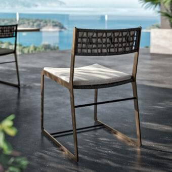 Distinguished Rugiano Atena chair with dark grey hand-braided rope and light grey cushion in bronze aluminum finish