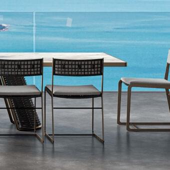 Exclusive Rugiano Atena chair with outdoor bronze aluminum and hand-braided grey rope with gray textile cushioning