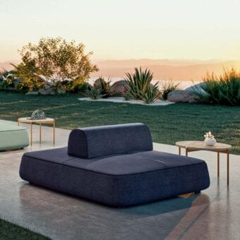 Sophisticated Rugiano Melody sofa with comfortable dark blue textured fabric and a minimalist geometric form