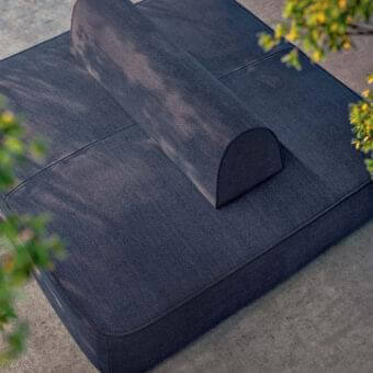 Elegant Rugiano Melody sofa with dark blue woven textile upholstery and matte finish for outdoor use