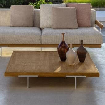Exceptional Talenti Allure coffee table with a medium-toned brown solid wood top and light white aluminum legs