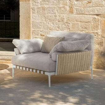 Distinctive Talenti Salinas lounge chair with light gray woven textile and padded beige ribbed straps in a white metal frame