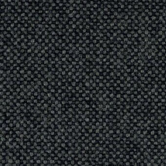 Charcoal gray looped pile fabric displays a dense, repetitive circular pattern with a heathered fibrous background and consistent geometric rhythm.