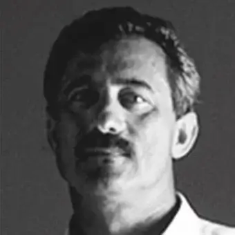 Grayscale portrait of a man with short dark hair and mustache looking upwards with defined features and shadowed facial planes