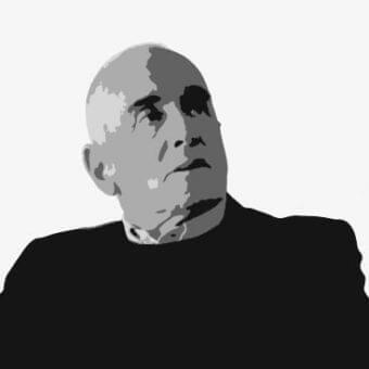 Bald head and shoulders are shown in grayscale, facing upward with dark facial features and a black garment