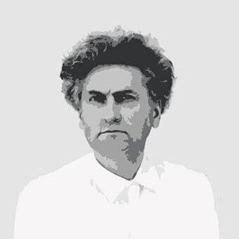 Grayscale portrait of a man facing forward with dark textured hair and a collared shirt against a light gray background