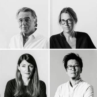 Grid of four black and white head and shoulders portraits featuring diverse people with direct gazes against light gray backgrounds