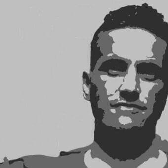 High contrast grayscale portrait of a male face angled right with simplified tones and a light gray background