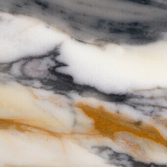 Paonazzo marble texture with swirling white, gray, and gold veins, polished surface displaying organic crystalline patterns.