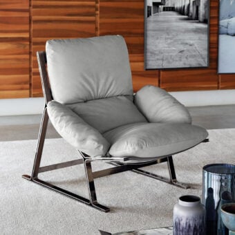 Superior Arketipo Belair lounge chair with light gray padded elements and polished chrome metal frame built with Leatherette straps