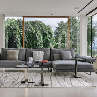 Superior Arketipo Ego sectional with geometric lines upholstered in matte gray textile and chromed metal feet