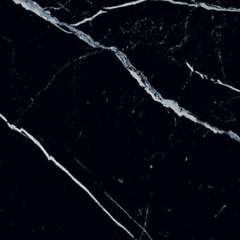 Black marquina marble texture with white and gray veins, polished finish, displaying irregular swirling patterns and a fine-grained surface.