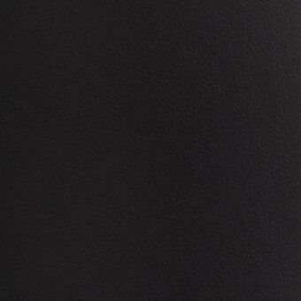 Matte black metal texture displaying a granular powder coating, uniform deep black color, and consistent non-reflective surface against a black background.