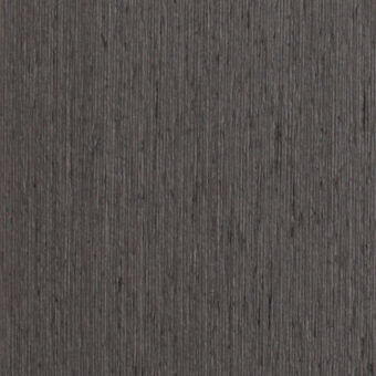 Dark gray textured surface with vertical striations, displaying a consistent linear pattern and matte finish, suggesting a fibrous material.