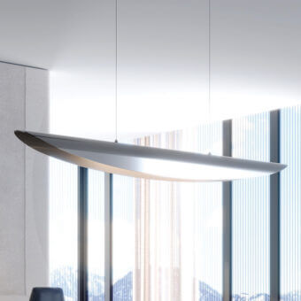 Stylish Reflex Ala suspension lamp with a curved steel structure and warm latte interior finish