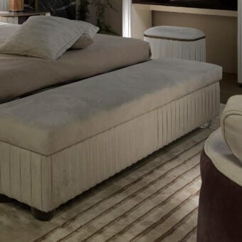 Sophisticated Reflex Plissé bench upholstered in light beige pleated textile with dark Murano glass feet