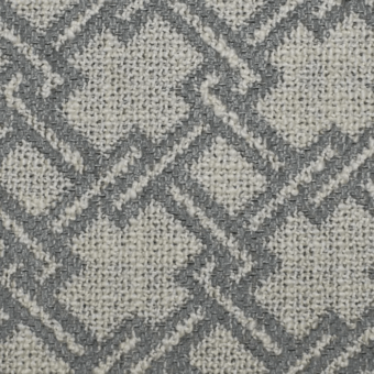 Diamond plaid fabric sample in gray and off-white tones features a dense, textured weave with intersecting lines forming a geometric pattern.