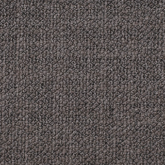 Textured gray fabric with a dense, granular weave and repeating pattern, displaying a matte finish and subtle tonal variations throughout.