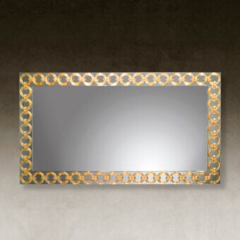 Distinguished Reflex Casanova mirror crafted in Italy with extra-clear glass and gold finished Murano glass rings