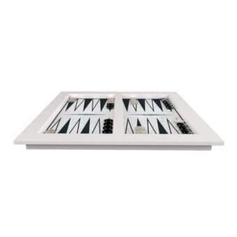 Checkers game board in white frame, black and white triangles, arranged pieces, studio shot, simple design, clean lines, alternating rows.