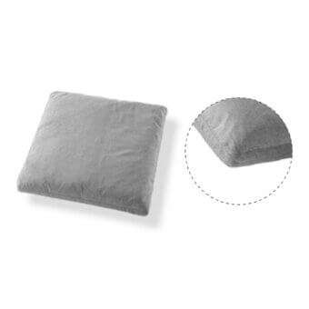 Gray square pillow, soft fabric texture, detailed corner closeup, neatly stitched edges, diffused studio lighting, neutral tone.