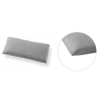 Gray lumbar cushion with rounded rectangle shape, featuring a textured matte surface and crescent profile, shown with a close-up inset.