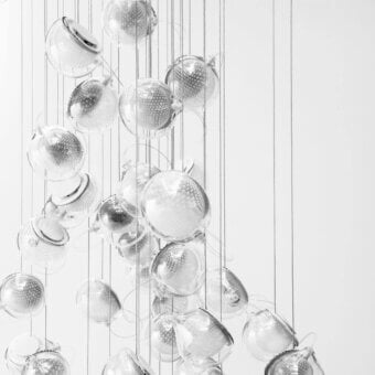 Exceptional Bocci 76 Random suspension lamp crafted with hot white and clear glass plus delicate copper mesh detailing