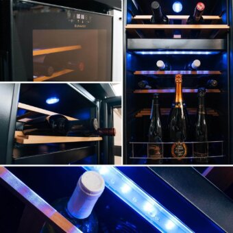 Wine refrigerator, dark gray steel exterior, illuminated blue interior with angled wooden shelves displaying multiple wine and champagne bottles.