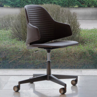 Distinguished Reflex Vela office chair with dark brown leather upholstery and polished aluminum central base with wheels