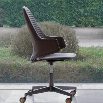Sophisticated Reflex Vela office chair in dark brown resin and wood with luxury leather upholstery and polished aluminum base