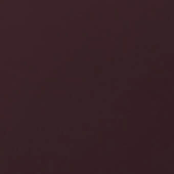 Matte burgundy lacquered surface, uniform color swatch, laccato opaco burgundi x163, studio product sample, neutral background.