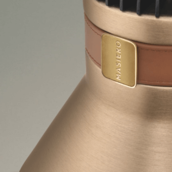 Distinguished Masiero Cordea table lamp with soft leather and metal in brushed light gold finish