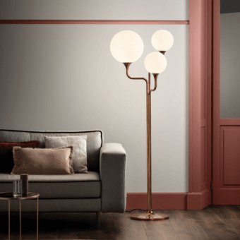 Exceptional Masiero Tee floor lamp with a solid metal frame and luminous textured white glass spheres in a rich copper finish