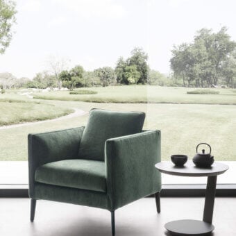 Exceptional Presotto Raffaello lounge chair built in muted green textile with a textured finish and slender metal legs