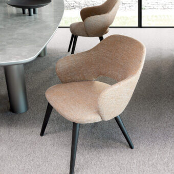 Elegant Presotto Verbena armchair crafted in Italy with light brown textured textile upholstery and black finished Ash legs