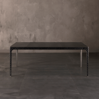 Distinguished Rugiano Alexander table with sleek dark top and shiny metal legs crafted in bronzed brass or chrome accents
