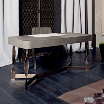 Distinguished Rugiano Pliet desk with gray Italian leather upholstery and bronzed brass spiral steel legs