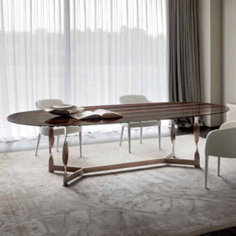 Distinguished Rugiano Pliet table with ebony wood top and bronzed brass base showcasing a twisted design and glossy finish