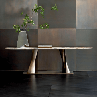 Impeccable Rugiano Rea console with light cream and gray marble tabletop supported by curved bronzed brass pedestal legs in satin finish