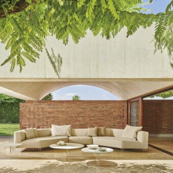 Sophisticated Varaschin Belt Air sectional with light beige textile upholstery and sleek aluminum supports