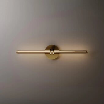 Venicem wall lamp, brushed brass finish, horizontal rectangular bar with parallel rods, mounted on gradient gray wall, minimalist design.